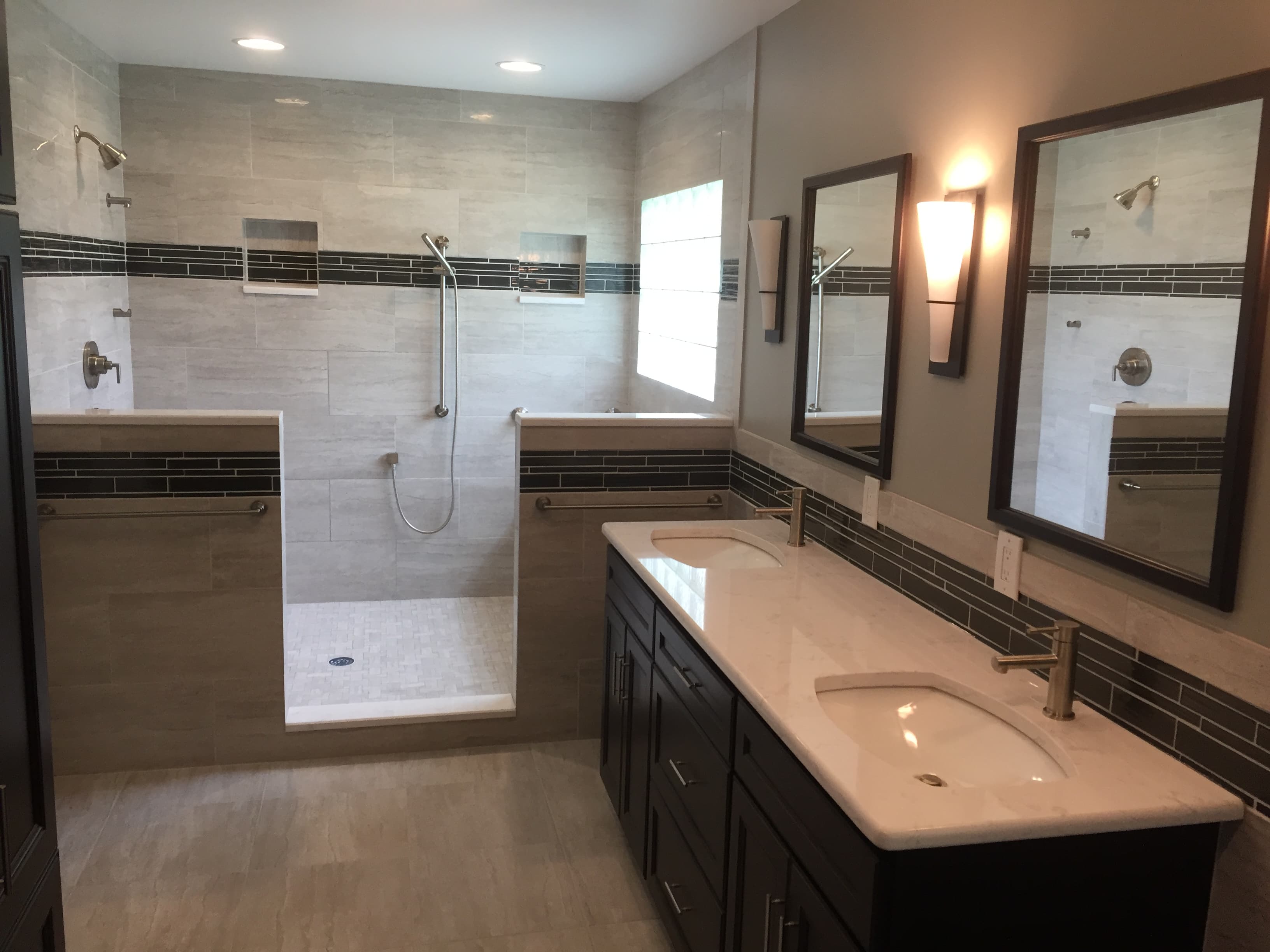 Walk-in tile shower with modern bathroom finishes